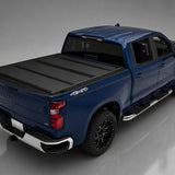 BAKFlip MX4 tonneau cover on 2019-2027 Chevy/GMC Silverado/Sierra 1500 5'8" bed, high rear three-quarter view, cover closed