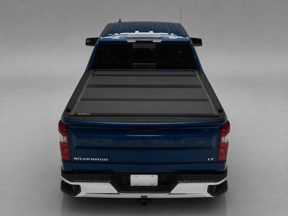 BAKFlip MX4 tonneau cover on 2019-2027 Chevy/GMC Silverado/Sierra 1500 5'8" bed, straight rear view, cover closed