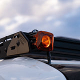 Rigid Industries Revolve LED Pod Light Pair Kit with Amber Backlight and Wiring Harness: Revolve LED pod pair with amber backlight